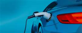 An electric vehicle (EV) charges. (Image: Adobe Stock)