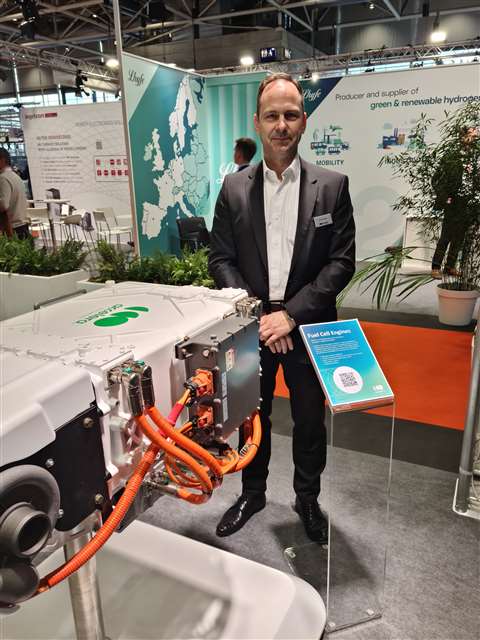 Michael Sengpiel, with the latest fuel cell stack from Accelera by Cummins